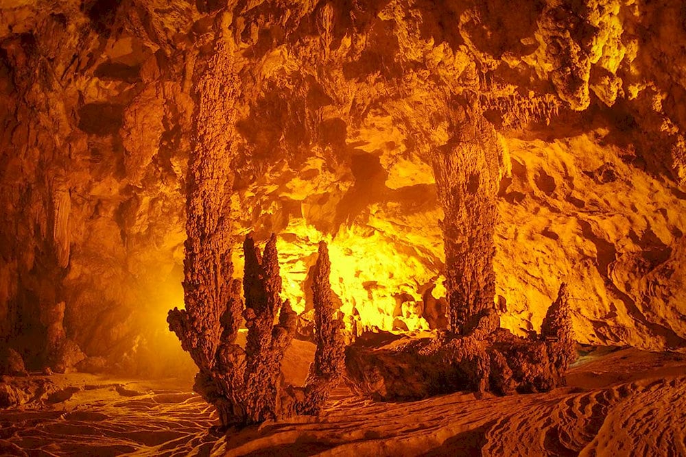 As you venture deeper, the cool, refreshing air offers a peaceful contrast to the heat outside, enhancing the sense of adventure
